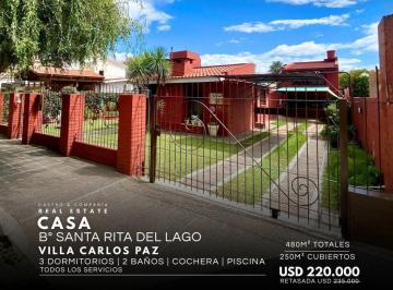Casa · 250m² · 6 Ambientes · 1 Cochera · Venta de Casa 3 Dorm. y Pileta en Barrio Residencial Santa Rita del Lago - Villa Carlos Paz