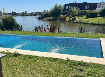 Casa · 225m² · 6 Ambientes · 2 Cocheras · Casa a La Laguna en Venta y Alquiler en Islas, Canton Barrio Privado