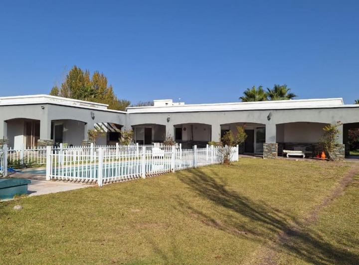 Casa · 344m² · 4 Dormitorios · 1 Cochera