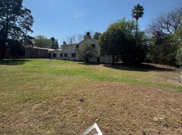 Casa · 1000m² · 10 Ambientes · 3 Cocheras · Propiedad de Gran Escala en San Lorenzo – 5.000 m² de Terreno – Ideal Vivienda o Proyecto