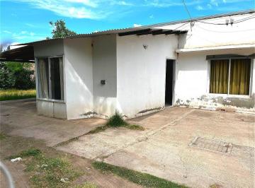 Casa · 112m² · 4 Ambientes · 2 Cocheras · Casa en Venta con Amplio Terreno