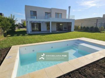 Casa · 190m² · 5 Ambientes · 6 Cocheras · Casa en Venta en Barrio Norte El Cantón | Calidad Premium | Pileta con Borde Infinito | Dependencia