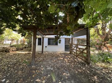 Casa · 100m² · 3 Ambientes · 1 Cochera · Casa en Venta Los Hornos 2 Dorm. Quincho Lote 1000 m²