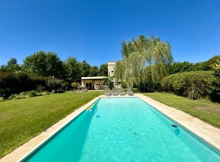 Casa · 152m² · 5 Ambientes · 4 Cocheras