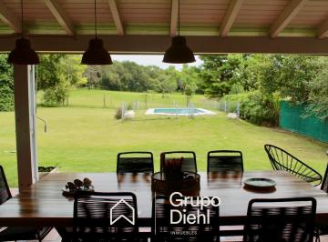 Casa · 1500m² · 6 Ambientes · 2 Cocheras · Casa con Gran Potencial en Venta Fondo Golf en Lomas de La Carolina, Zona Norte