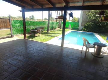 Casa · 90m² · 4 Ambientes · 2 Cocheras · Casa en Roldan