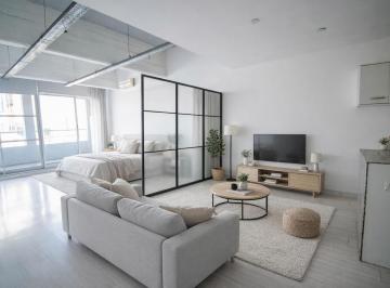 Foto realizada con IA mostrando un eventual set up del ambiente. · Departamento en Venta en Villa Urquiza con Cochera Fija y Amenities