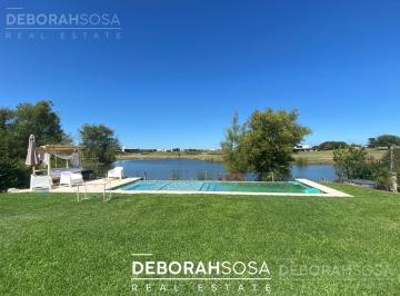 Casa · 221m² · 5 Ambientes · 4 Cocheras · Venta Hermosa Casa en Canton Golf con Fondo Al Agua.