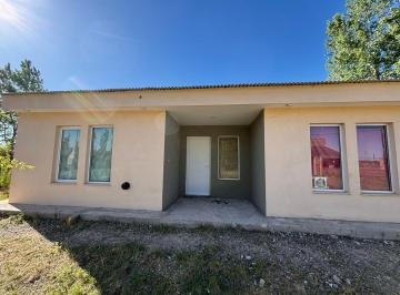 Casa · 74m² · 3 Ambientes · 1 Cochera · Venta o Permuta de Casa en Barrio Las Lagunas, Plottier