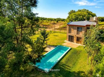 Casa · 65m² · 2 Ambientes · Venta - Casa de 2 Dorm. con Piscina, Jardín y Cochera - Bosque Azul, Funes. Apto Crédito.