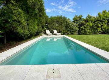 Pileta Renovada con Cemento Pulido · Casa en Venta en Los Alisos, Nordelta | Lote Amplio, Renovada y Domót