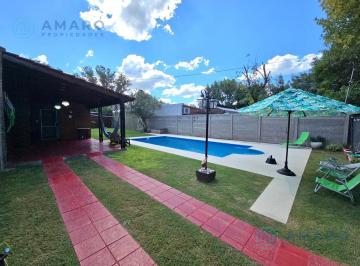 Casa · 50m² · 2 Ambientes · 1 Cochera · Venta · Casa · un Dormitorio · Piscina · Jardín · Quincho · Roldán