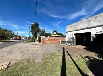 Edificio · 304m² · Venta Villa Elisa - Dos Galpones con Casa de un Dormitorio en Terreno de 1300 m²