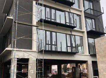 Oficina comercial · 1065m² · A Estrenar Edificio de Departamentos / Oficinas con 18 Cocheras