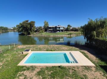 Casa · 180m² · 5 Ambientes · 2 Cocheras · Casa en Venta a La Laguna en El Cantón - Norte