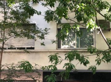 Entrada al Edificio · Departamento de Dos Ambientes Amplios