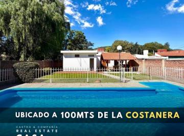 Casa · 219m² · 7 Ambientes · 1 Cochera · Exclusiva Casa en Venta 3 Dorm. con Pileta en Barrio Sol y Lago - Villa Carlos Paz