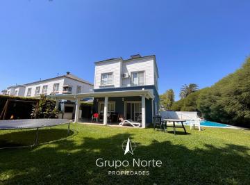 Casa · 140m² · 4 Ambientes · 1 Cochera · Casa en Venta en Portezuelo, Casas del Lago, Nordelta. Venta con Renta