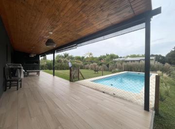 Casa · 129m² · 4 Ambientes · 6 Cocheras · Casa en La Reserva