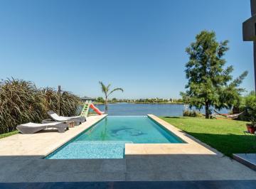 Casa · 190m² · 5 Ambientes · 8 Cocheras · Luminosa Casa en Venta y Alquiler en El Cantón – B° Puerto con Salida a La Laguna.
