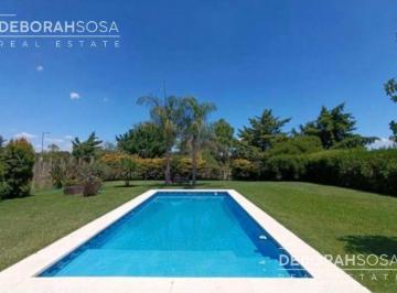 Casa · 221m² · 7 Ambientes · 4 Cocheras · Oportunidad Única! Casa en Venta en El Cantón 7 Ambientes con Piscina
