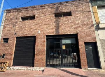 Bodega-Galpón , Córdoba · Merger Alquila Galpon de 100 m² con Entre Piso, Baño y Sector Oficina o Showroom. Porton Electrico