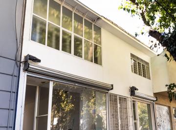 Frente · Locales Comerciales y Oficinas