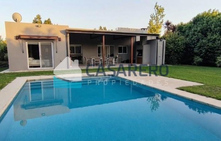 Casa · 145m² · 5 Ambientes · 2 Cocheras