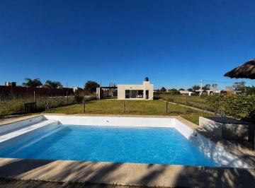 Casa · 89m² · 3 Ambientes · 1 Cochera · Casa en Roldán