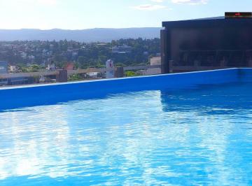 Departamento de 2 ambientes, Villa Carlos Paz · 1 Dormitorio, Amplio, con Patio, Pileta y Exc. Ubicación.