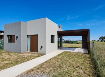 Casa · 53m² · 2 Dormitorios · 1 Cochera · Casa en Ibarlucea