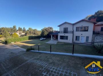 Casa de 12 ambientes, La Falda · Complejo en Venta C/ Cocheras en La Falda