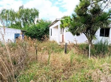 Casa · 98m² · 3 Ambientes · 1 Cochera · Venta de Terreno con Construcción en Pando