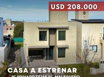 Casa · 202m² · 7 Ambientes · 1 Cochera · Venta Casa de Categoría a Estrenar de 2 Dorm. en Barrio Cerrado Tejas IV - Malagueño