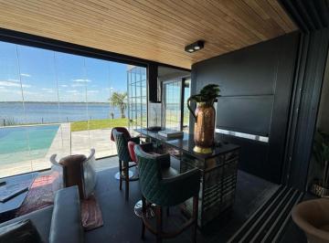 Casa · 380m² · 6 Ambientes · 2 Cocheras · Casa a Estrenar en Marinas - Puertos del Lago: Tu Refugio Al Lago.