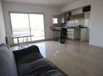 living  con cocina integrada · Depto. a Estrenar 3 Amb. en Alquiler 24 m. Al Frente con Cochera