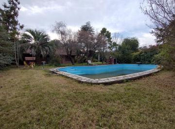 Casa · 100m² · 3 Ambientes · 1 Cochera · Venta. Casa Dos Ambientes. Mas Monoambiente. Pileta y Galpón. Lote 1.400 m². Parque Sakura