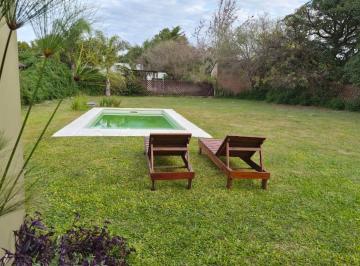 Casa · 106m² · 3 Ambientes · 1 Cochera · Casa con Pileta Km 10 Ruta 1
