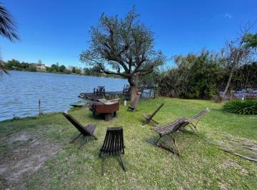 Casa · 340m² · 7 Ambientes · 4 Cocheras · Casa en Alquiler a La Laguna - Barrio Altamira