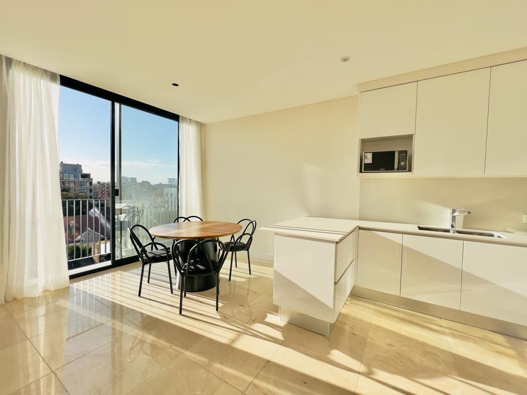 Venta 2 ambientes con cochera y baulera en Tilos Único. Unidad 303