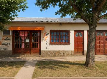Casa · 102m² · 4 Ambientes · 1 Cochera · Casa con Local Comercial por Av 9 de Julio Nº 573