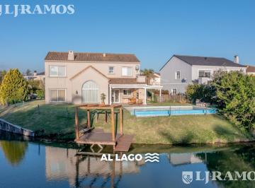 Casa · 228m² · 7 Ambientes · Casa a La Laguna con 4 Dorm. en Venta Y/o Alquiler en Barrancas del Lago.