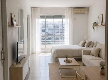 Simulacro de distribución de muebles con IA · Súper Luminoso y Amplio Mono Ambiente en Piso 15 en Zona Estratégica del Barrio de La Boca, Contra F