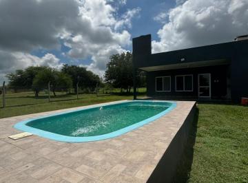 Quinta vacacional · 70m² · 3 Ambientes · 3 Cocheras · Se Alquila Casa Quinta de Manera Permanente Colonia Nueva a m de Ruta