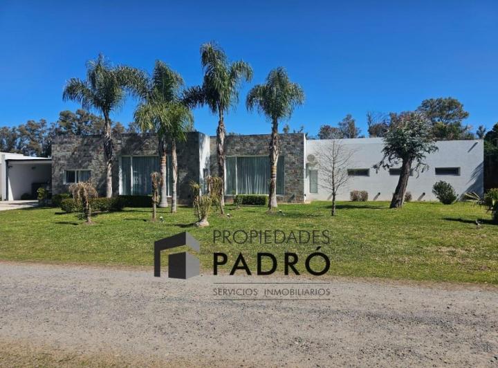 Casa · 400m² · 6 Ambientes · 4 Cocheras