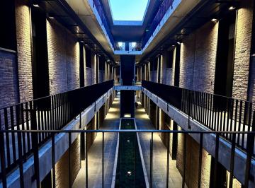 Departamento · 117m² · 3 Ambientes · 1 Cochera · Impecable Loft con Entrepiso, 1 Dormitorio (Posibilidad Realizar 2do), 2 Baños, Seguridad Amenities