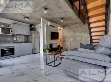 Departamento · 59m² · 2 Ambientes · 1 Cochera · Moderno Loft Estilo Brutalista - Amoblado con Vista Abierta, Muy Luminoso