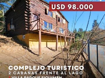 Hotel · 142m² · 8 Ambientes · Venta Complejo de 2 Cabañas con Piscina Frente Al Lago San Roque en Parque Siquiman