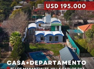 Casa · 302m² · 10 Ambientes · 2 Cocheras · Venta Casa con Pileta con Departamento Independiente en Los Manantiales – Villa Carlos Paz