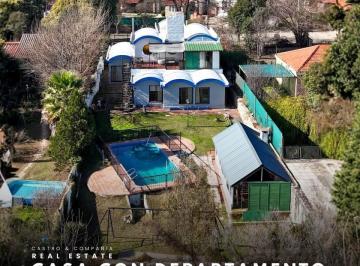Casa · 302m² · 10 Ambientes · 2 Cocheras · Venta Casa con Pileta con Departamento Independiente en Los Manantiales – Villa Carlos Paz